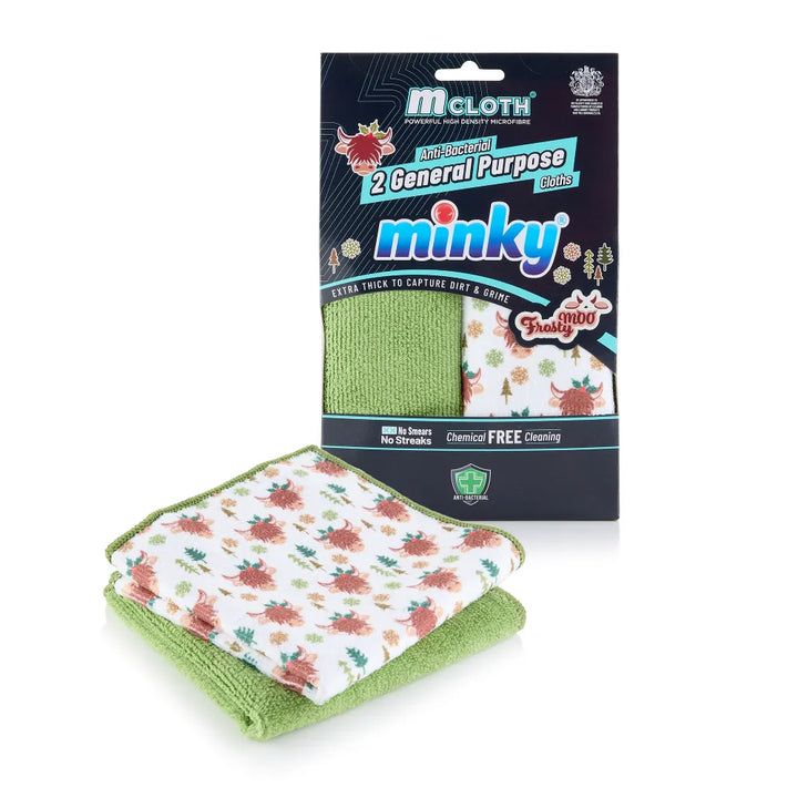 Minky cloth with floral pattern and green edge, displayed with packaging on a white background